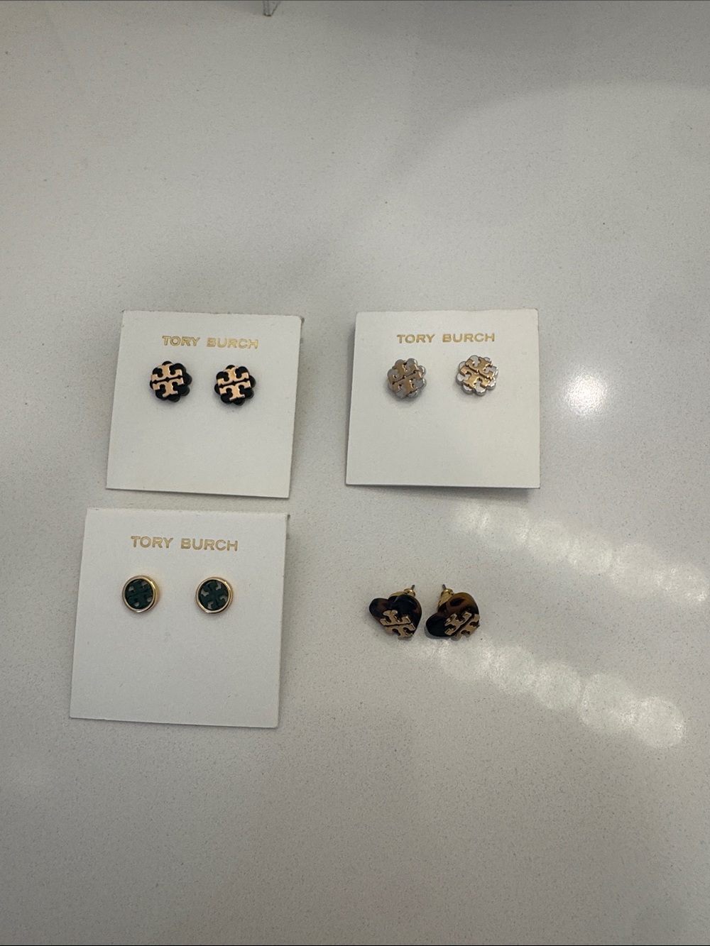 Tory Burch Gold-Trim Logo Stud Earrings in Black and Green